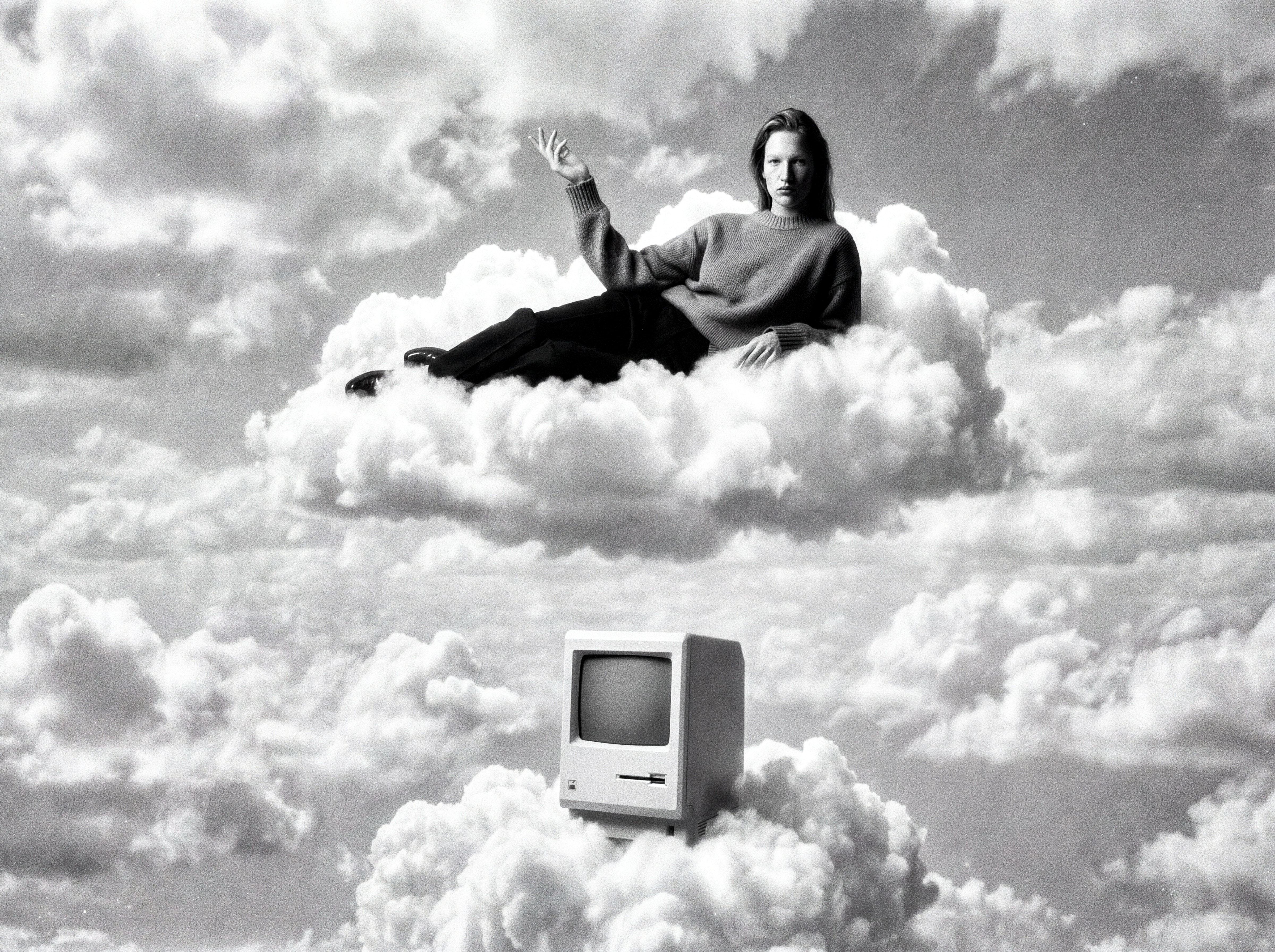 Calleoke — Subject reclining on a cloud above a Macintosh terminal.