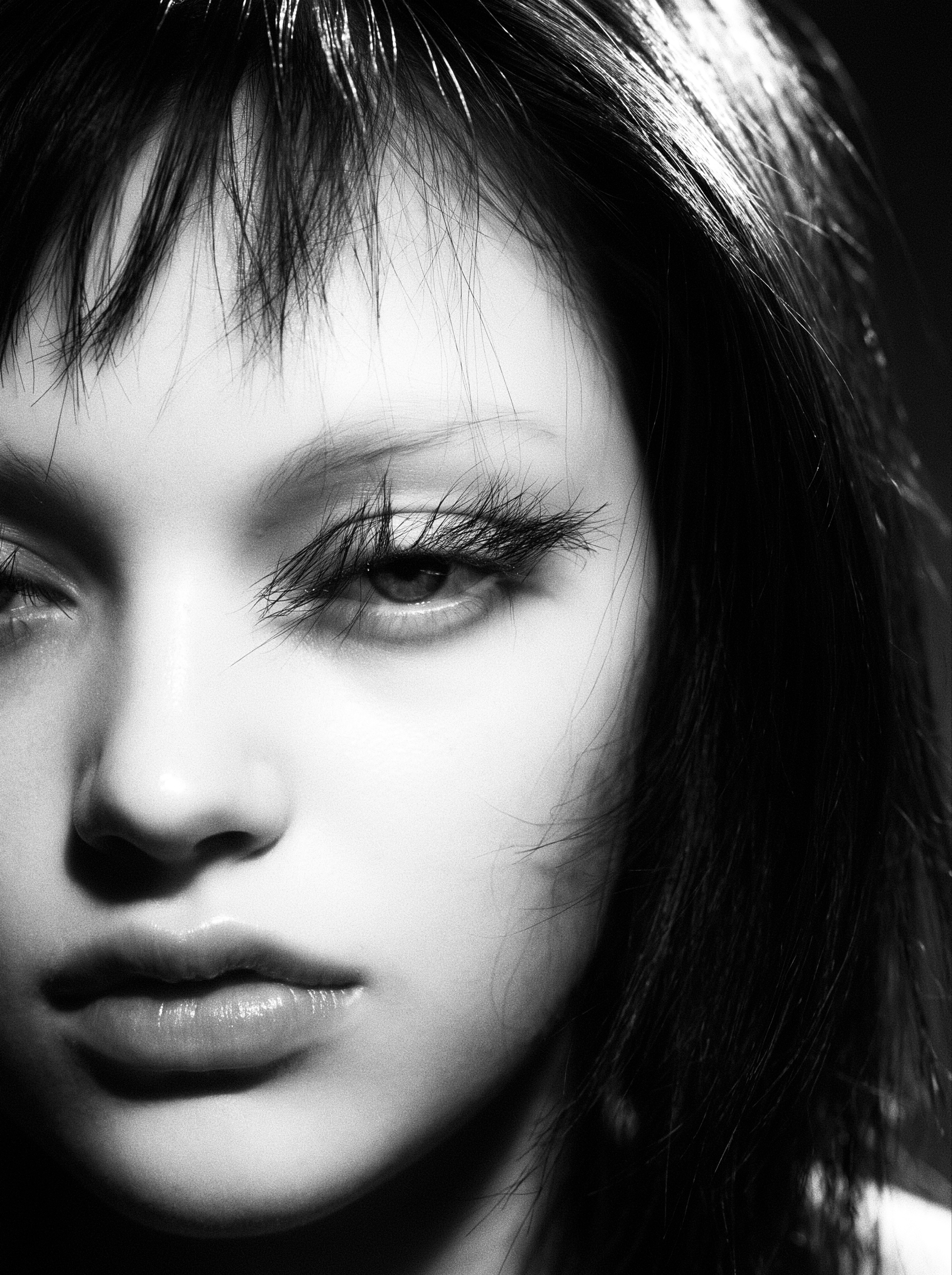 Studio Super Intelligence – monochrome close-up portrait.